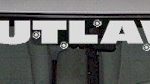 WSD343 Outlaw With Bulletholes Windshield Decal